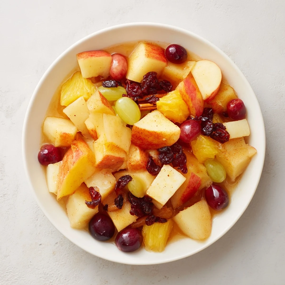 Steaming spiced fruit simmering in a saucepan: a warm, delicious dessert picture.