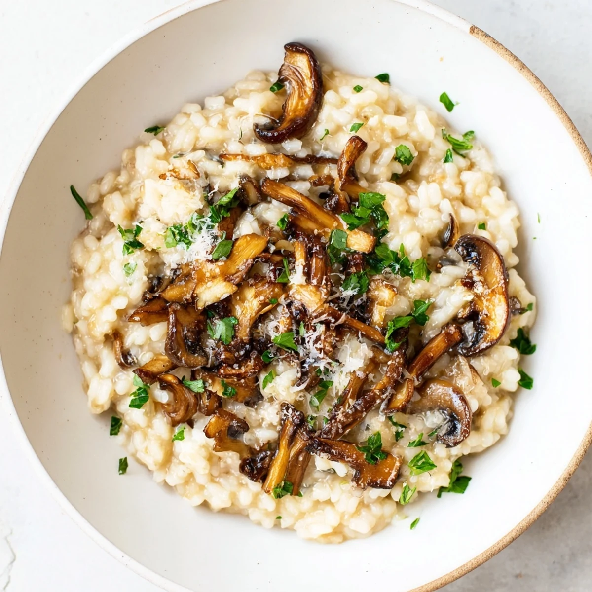 A steaming bowl of mushroom risotto, fragrant and rich, perfect for a cozy weeknight dinner.