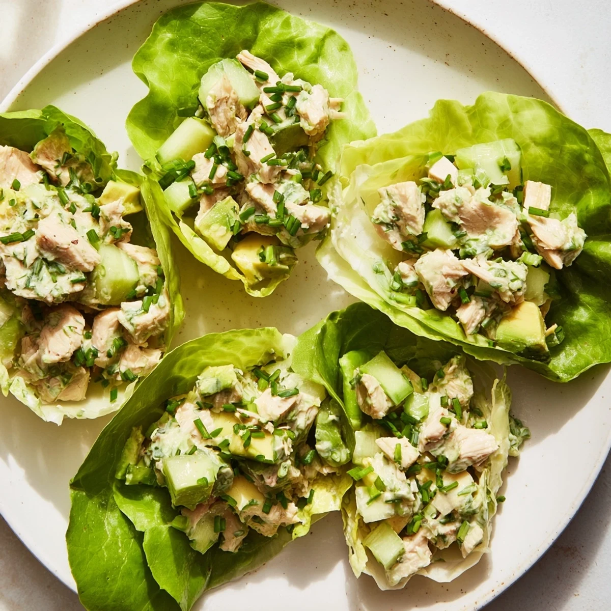 Tender roasted chicken and creamy Green Goddess dressing nestled in crisp butter lettuce cups for a fresh bite.