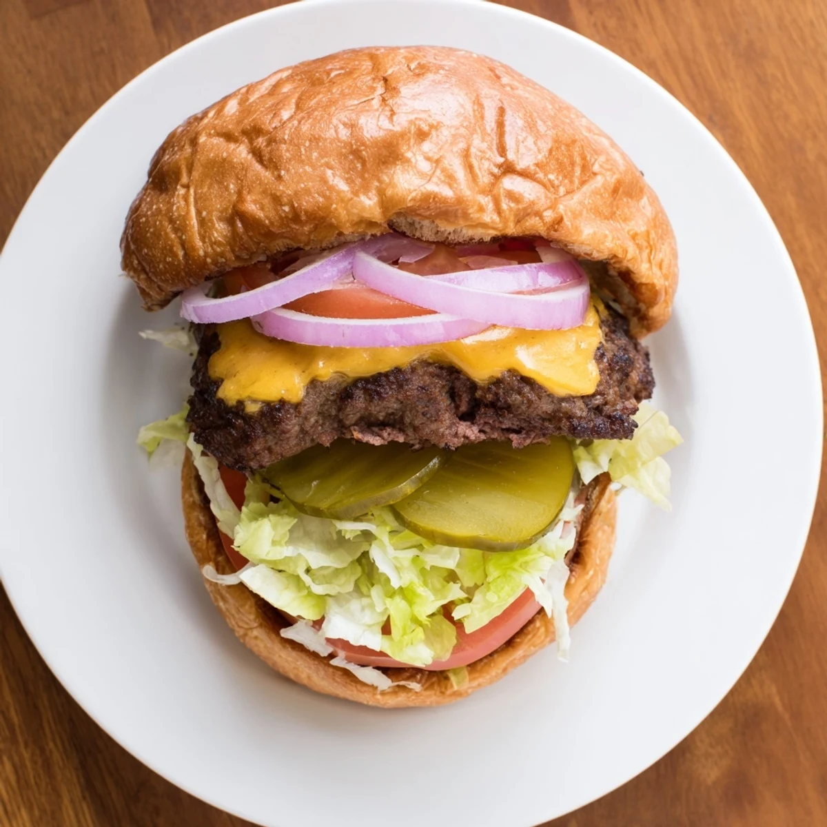 Golden-brown juicy smash burger with melted American cheese on toasted brioche bun