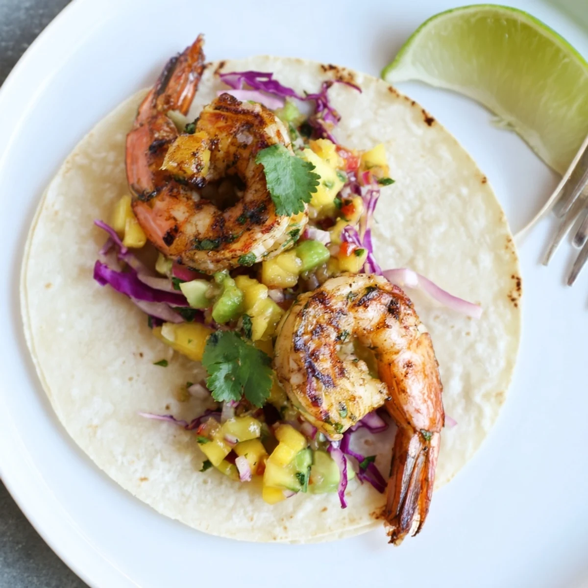 Cilantro Lime Shrimp Tacos With Mango Salsa on warm corn tortillas, vibrant colors
