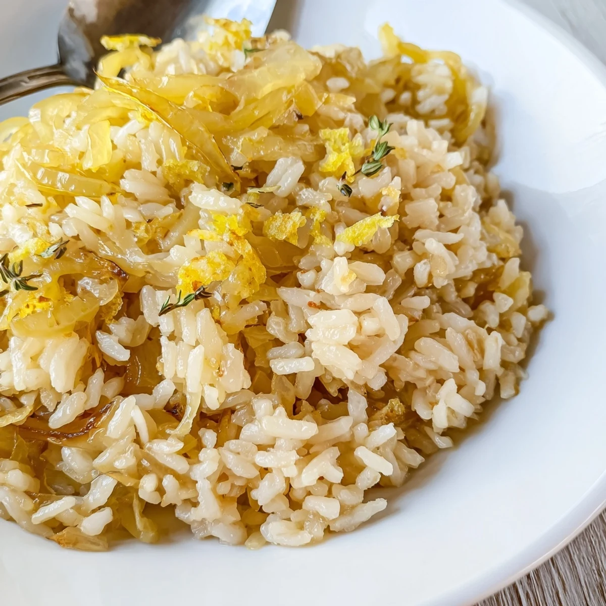 Topped with crunchy bread croutons and thyme, French Onion Soup Rice arrives warm.