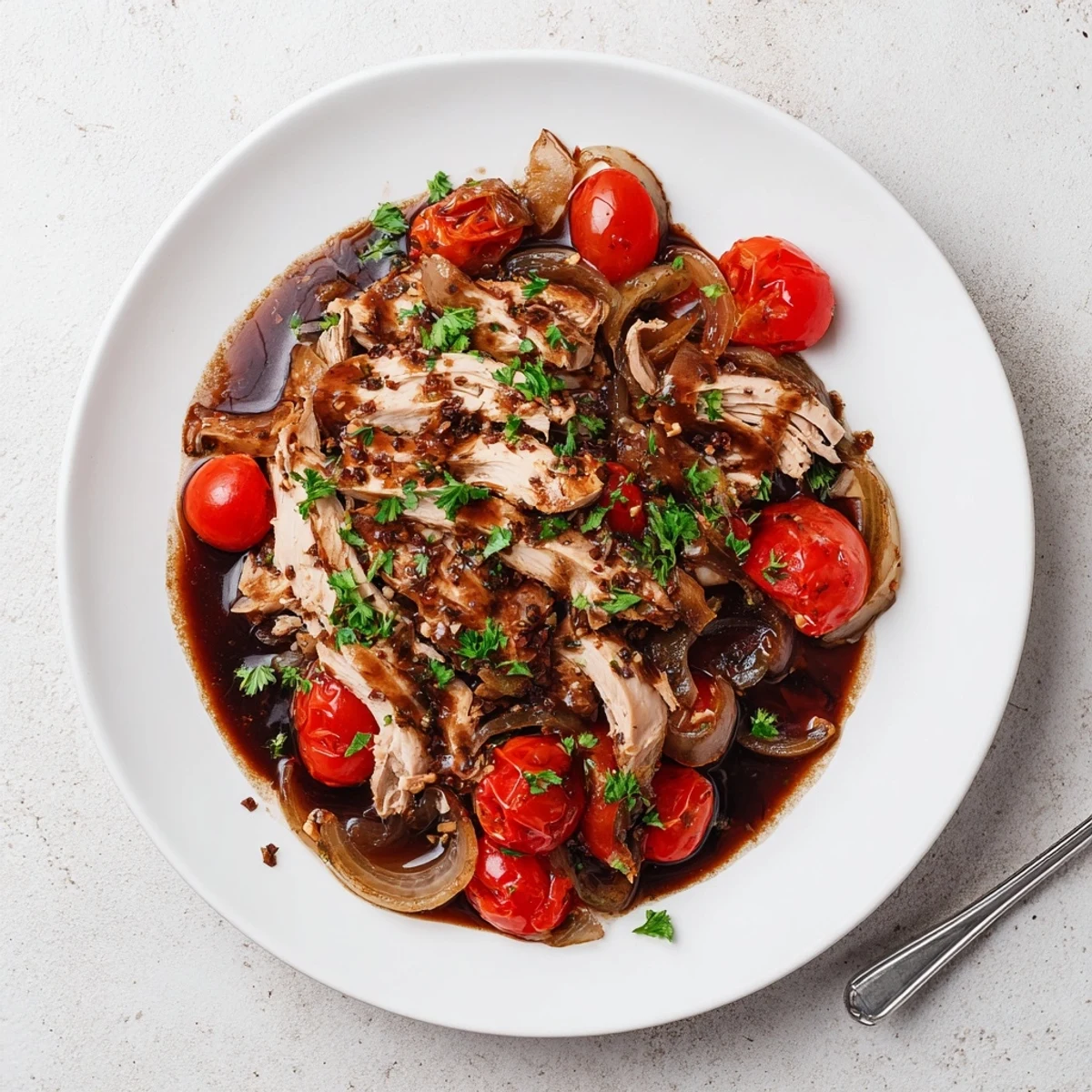 Slow Cooker Balsamic Chicken with tender juicy breasts glazed in tangy dark sauce